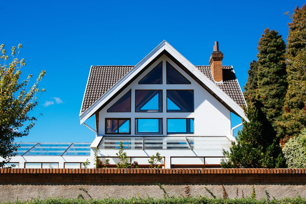 Contemporary home with large glass windows and ceramic film