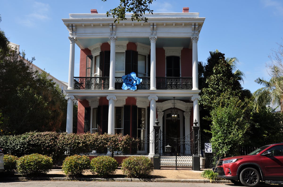 Classic New Orleans home with columns and window film