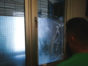 Home window tinting series : Installing home window tint in frosted.